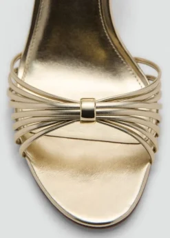 Heeled sandals with straps